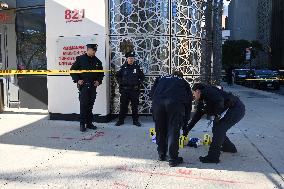 Evidence Markers Placed Where Knives Were Recovered After Stabbings Left Two People Dead And One Person Critically Wounded In Ne