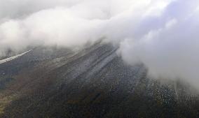 Mt. Daisen covered with season's 1st snow