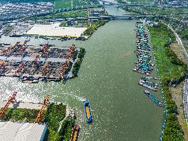 Ships Transporting Containers at Chongxian Port in Hangzhou