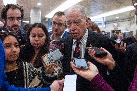 Senators Walk Past Reporters In Capitol - Washington