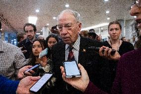 Senators Walk Past Reporters In Capitol - Washington