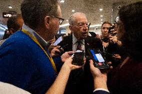 Senators Walk Past Reporters In Capitol - Washington