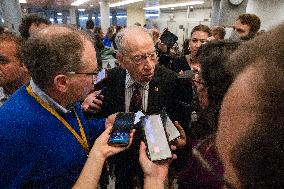 Senators Walk Past Reporters In Capitol - Washington