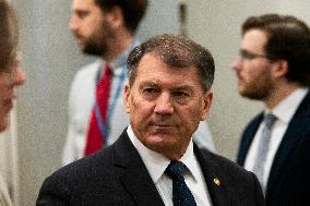 Senators Walk Past Reporters In Capitol - Washington