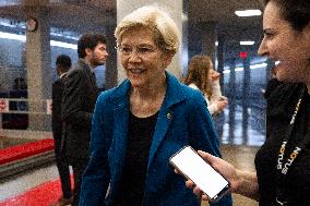 Senators Walk Past Reporters In Capitol - Washington