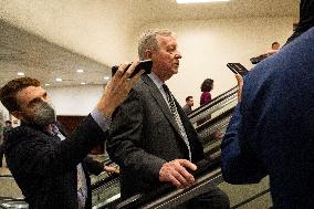 Senators Walk Past Reporters In Capitol - Washington