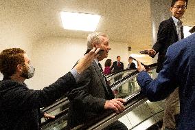 Senators Walk Past Reporters In Capitol - Washington