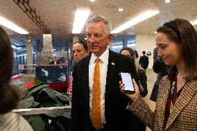 Senators Walk Past Reporters In Capitol - Washington