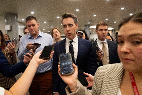 Senators Walk Past Reporters In Capitol - Washington