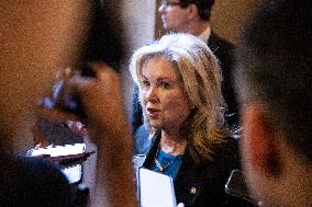 Senators Walk Past Reporters In Capitol - Washington