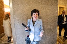 Senators Walk Past Reporters In Capitol - Washington