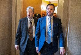 Senators Walk Past Reporters In Capitol - Washington