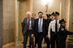 Senators Walk Past Reporters In Capitol - Washington