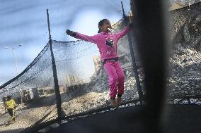 Children Entertain Amid Ruins - Gaza