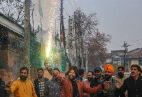 BJP Supporters In Srinagar Celebrate After Winning Maharashtra State Assembly Elections