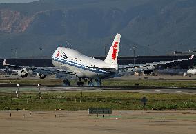 An Air China Boeing 747 lands in Barcelona carrying the President of the National Assembly of China