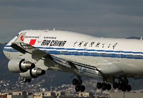 An Air China Boeing 747 lands in Barcelona carrying the President of the National Assembly of China