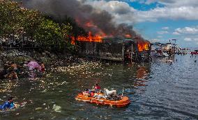 Fire Engulfing A Slum Area In Manila