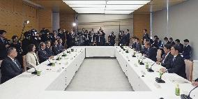 Japan's government holds meeting on wages