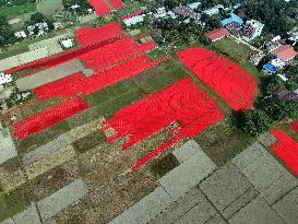 Drying Red Fabric - Bangladesh