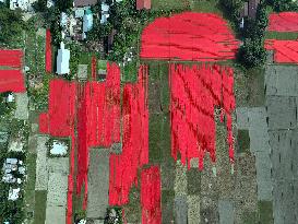 Drying Red Fabric - Bangladesh