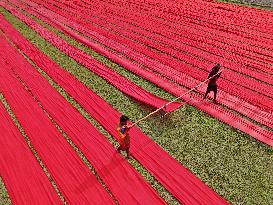 Drying Red Fabric - Bangladesh