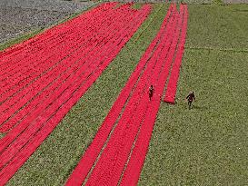 Drying Red Fabric - Bangladesh