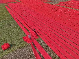 Drying Red Fabric - Bangladesh