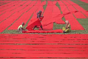 Drying Red Fabric - Bangladesh