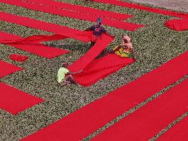 Drying Red Fabric - Bangladesh