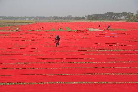 Drying Red Fabric - Bangladesh