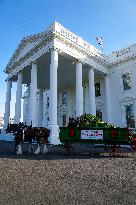 Presidential Grandson Beau Biden Joins The First Lady At The Arrival Of The White House Christmas Tree.