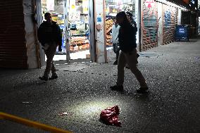 Crime Scene Investigators At Scene Where 29-year-old Man Killed In Shooting In Fleetwood Section Of Bronx New York