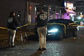 Crime Scene Investigators At Scene Where 29-year-old Man Killed In Shooting In Fleetwood Section Of Bronx New York