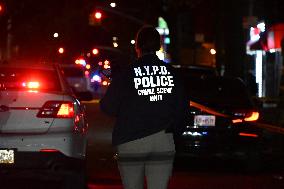 Crime Scene Investigators At Scene Where 29-year-old Man Killed In Shooting In Fleetwood Section Of Bronx New York