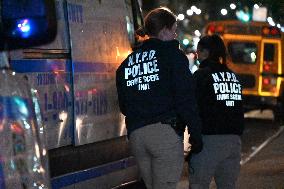 Crime Scene Investigators At Scene Where 29-year-old Man Killed In Shooting In Fleetwood Section Of Bronx New York