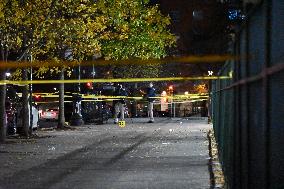 Crime Scene Investigators At Scene Where 29-year-old Man Killed In Shooting In Fleetwood Section Of Bronx New York