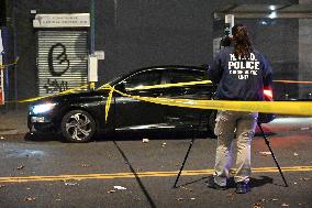 Crime Scene Investigators At Scene Where 29-year-old Man Killed In Shooting In Fleetwood Section Of Bronx New York