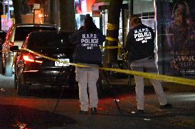 Crime Scene Investigators At Scene Where 29-year-old Man Killed In Shooting In Fleetwood Section Of Bronx New York