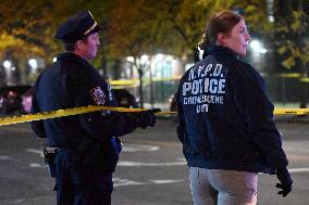 Crime Scene Investigators At Scene Where 29-year-old Man Killed In Shooting In Fleetwood Section Of Bronx New York