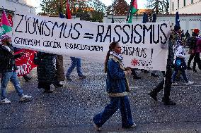 Demonstrators Display Anti-Israel Banners And Flags At A Pro-Palestinian Rally In Munich