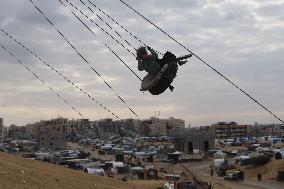 Children Entertain On A Swing - Khan Younis