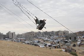 Children Entertain On A Swing - Khan Younis