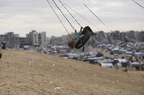 Children Entertain On A Swing - Khan Younis