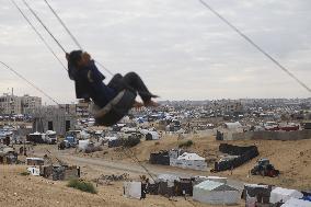 Children Entertain On A Swing - Khan Younis