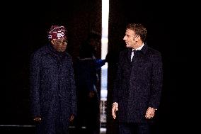 Macron And Nigerian Counterpart Bola Tinubu At The Invalides - Paris