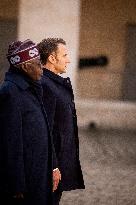 Macron And Nigerian Counterpart Bola Tinubu At The Invalides - Paris