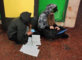 People shelter in Kyiv Metro during air alert