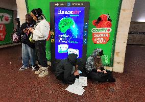 People shelter in Kyiv Metro during air alert