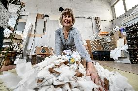 Volunteers weave winter camouflage nets for army in Zaporizhzhia